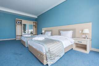 Отель Отель Caspian Riviera Grand Palace Актау Стандартный двухместный номер с 2 отдельными кроватями-1